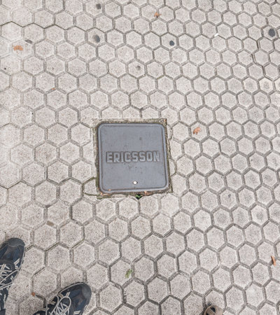 San Sebastian, Spain - July 27 2016: A cover for telecommunications in the street marked Ericsson.のeditorial素材