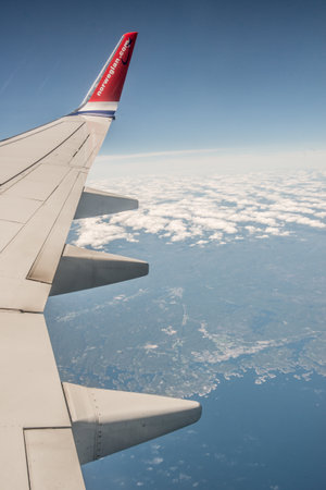 20000ft above Lillesand, Norway - July 20 2016:  Norwegian LN-NHD en route from OSL to LIS