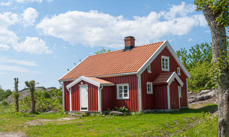 Traditional swedish red and white wooden house.の写真素材