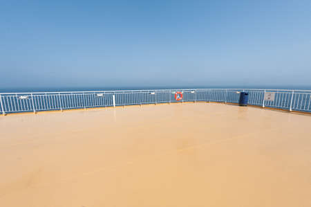 Beige aft deck of a passenger ferry.