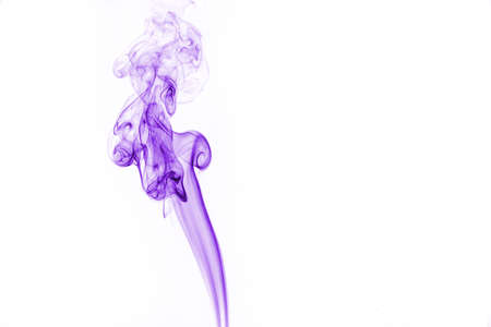Purple smoke on white background.の写真素材