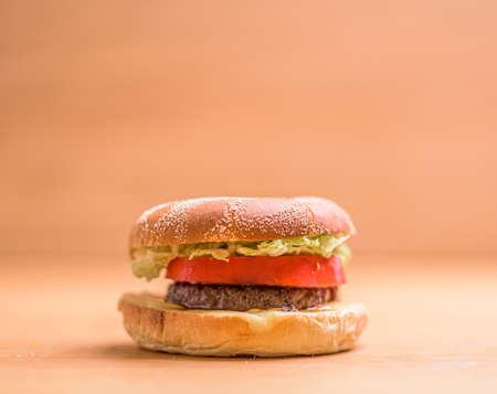 Hamburger with lettuce, tomato, meat and cheese.の写真素材