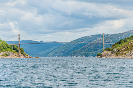 Lyngdal, Norway - July 19 2009: The Revøysund bridge in the way to Korshavn.のeditorial素材
