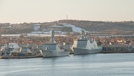 Frederikshavn, Denmark - December 28 2009: HDMS Triton F358 and  HDMS Absalon L16 at port in Frederikshavn.のeditorial素材