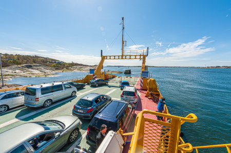 Gothenburg , Sweden - April 29 2012: Ferry Beda (IMO 8302363) ferrying cars and passengers between Lilla Varholmen and Hönö.のeditorial素材