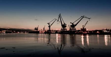 Gothenburg , Sweden - February 11 2013: The former yard and cranes in central Gothenburg at sunset.のeditorial素材