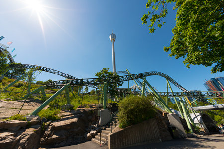 Gothenburg, Sweden - June 15 2014: Tracks of roller coaster Helix and in the background the Atmosfear tower.のeditorial素材