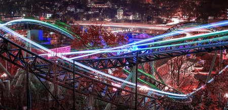 Gothenburg, Sweden - October 12 2017: Long exposure of roller coasters at the Liseberg amusement...