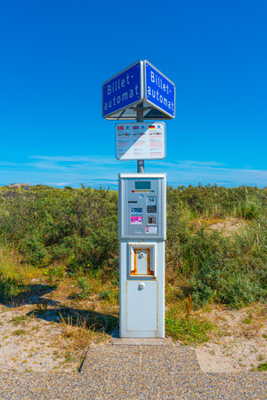 Skagen, Denmark - July 10 2019: Denmarks northernmost parking meter at Grenen.のeditorial素材