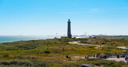 Skagen, Denmark - July 10 2019: The grey lighthouse, Det Grå Fyr, at Grenen.のeditorial素材