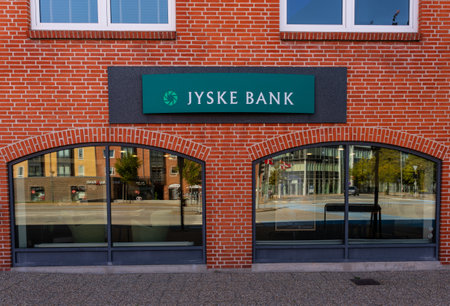 Frederikshavn, Denmark - July 11 2019: Logo of Jyske Bank in Frederikshavn.のeditorial素材