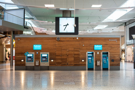 Gothenburg, Sweden - August 20 2019: ATMs and clock in the center of Nordstan shopping mall.のeditorial素材