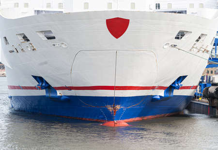 Waterline, bow and bulb of a white ro-ro passenger ferry..の写真素材