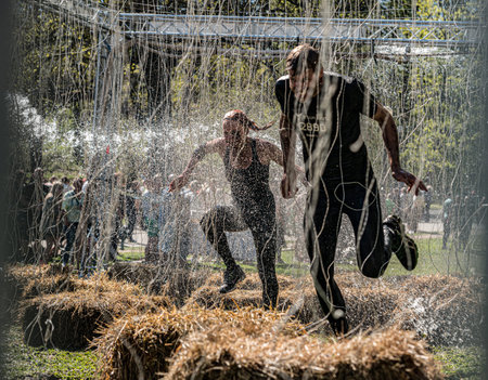 Gothenburg, Sweden - April 26 2014: Participants of the Tough Viking obstacle race in Slottsskogen...