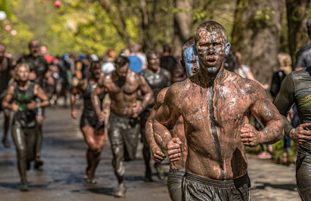 Gothenburg, Sweden - April 26 2014: Participants of the Tough Viking obstacle race in Slottsskogen.のeditorial素材