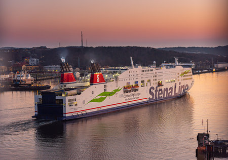 Gothenburg, Sweden - March 26 2020: Ro-Ro ferry Stena Scandinavica IMO 9235517 departing Gothenburg for Kiel in beautiful sunset.のeditorial素材