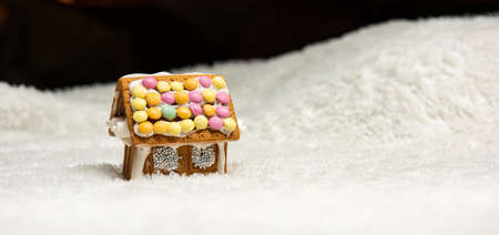 Neatly decorated ginger bread house..