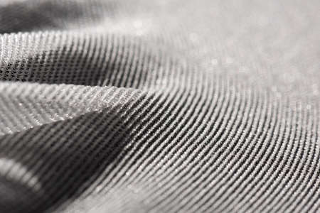 Texture of a fine white mesh on black background