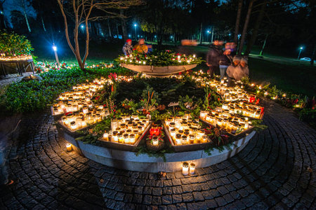 GÃ¶teborg, Sweden - november 02 2019: Grave candles on a cemetery on all saints eve.のeditorial素材