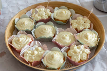 Delicious muffins on a plateの写真素材