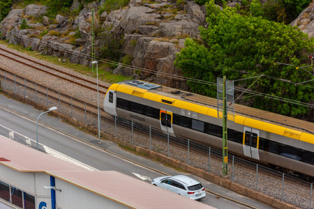 StrÃ¶mstad, Sweden - July 31 2021: VÃ¤sttÃ¥gen regional train arriving at StrÃ¶mstadのeditorial素材