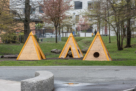 Gothenburg, Sweden - May 09 2021: Small beige playing huts made to resemble tipis.のeditorial素材