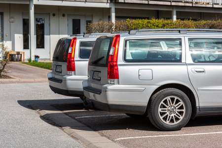 Gothenburg, Sweden - May 08 2021: Two identical Volvo V70 cars on a parking lot.のeditorial素材