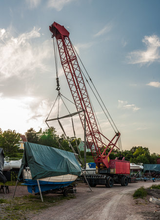 FiskebÃ¤ckskil, Sweden - June 05 2007: Mobile crane at a marina used for moving boats
