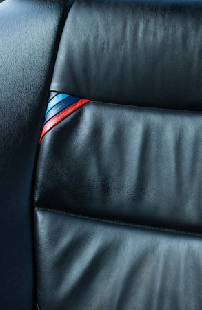 Lindesnes, Norway - August 18 2005: The BMW Motorsport colors in the back seat of a BMW M3..