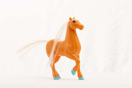 Plastic toy horse on white backgroundの写真素材