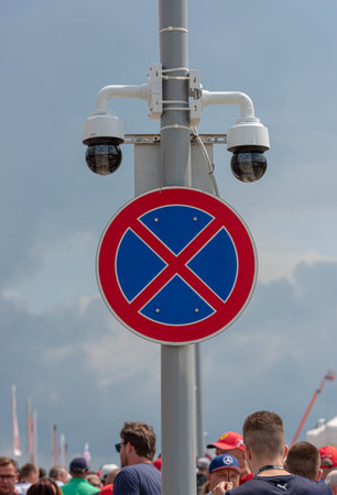 Budapest, Hungary - August 03 2019: Two surveilance cameras and a stop forbidden sign on a poleのeditorial素材