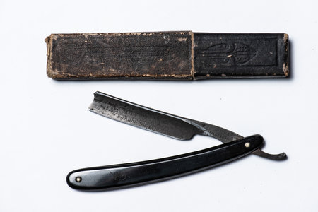 July 2019 - Lindesnes, Norway: Black, vintage straight razor with original case.のeditorial素材