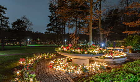 Gothenburg, Sweden - november 02 2019: Grave lights at a graveyard.のeditorial素材