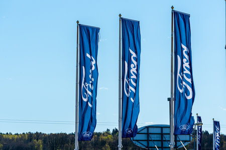Gothenburg, Sweden - April 25 2020: Ford logos on flags by a dealership.のeditorial素材
