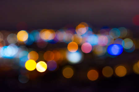 Out of focus lights of a city at night.