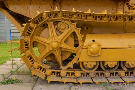 Details of a yellow old bulldozer
