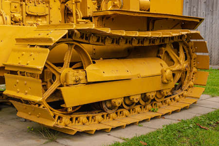 Details of a yellow old bulldozer