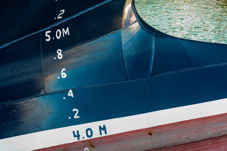 Bulb bow of a blue fishing ship.の写真素材