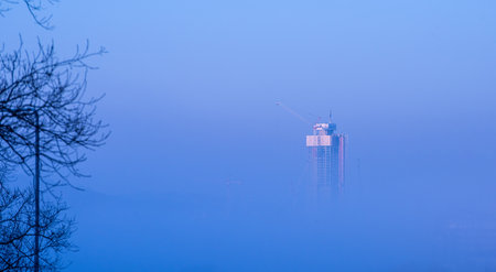 Gothenburg, Sweden - March 23 2022: Karlatornet under construction looking up through a dense fogのeditorial素材