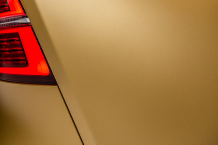 Gothenburg, Sweden - december 05 2021: Detail of rear light and side of a golden Polestar 1 hybrid electric carのeditorial素材