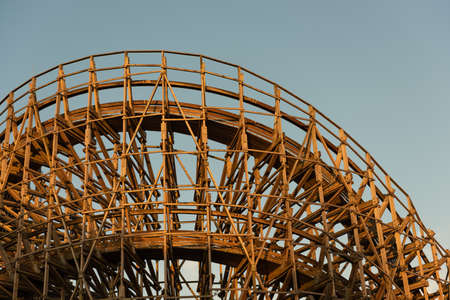 Curve of a large wooden roller coasterの写真素材