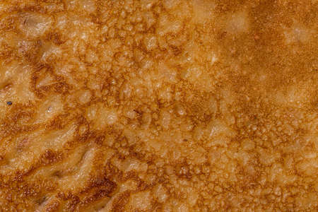 Details of freshly made pancakes on a plateの写真素材