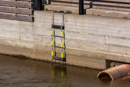 Rescue ladder by a riverの写真素材