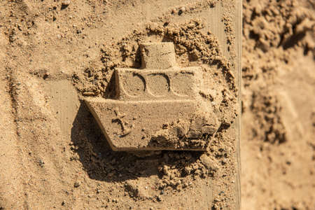 Sand formed as a ship at a playgroundの写真素材