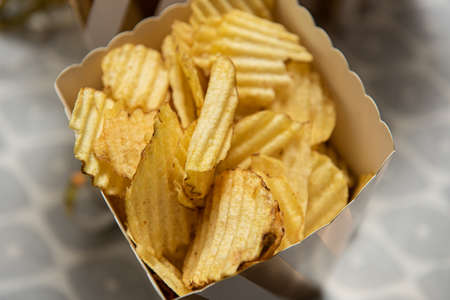 Chips in a paper cupの写真素材