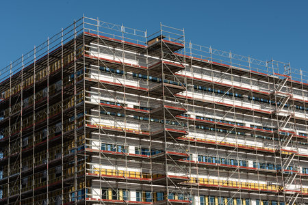Gothenborg, Sweden - February 27 2022: Scaffolding arounf an office building being renovated.のeditorial素材