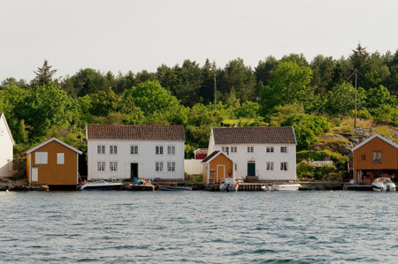 Lindesnes, Norway - July 06 2011: Old sailors homes by the sea at SvinÃ¸r.のeditorial素材