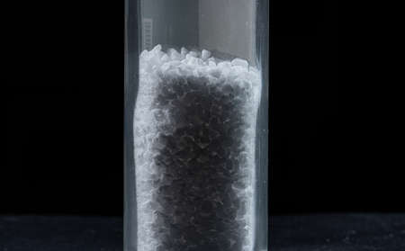 Sea salt in a narrow glass tube.の写真素材