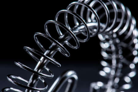 Metal whisk on black background.の写真素材