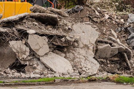 Condrete and rebar remains after an old building has been demolished.の写真素材